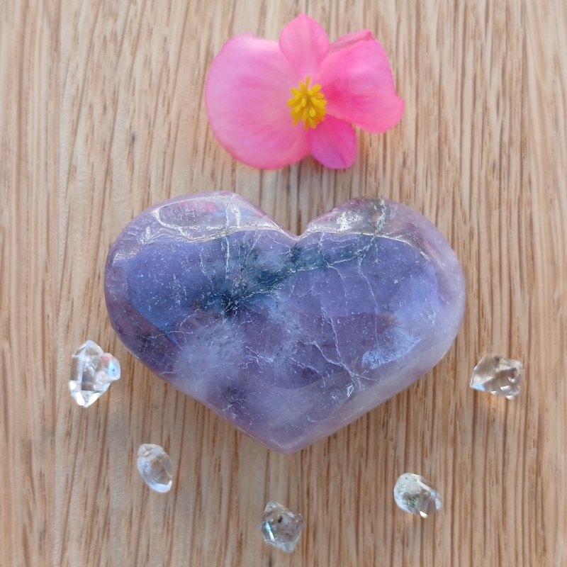 Purple heart-shaped crystal with pink flower and clear stones
