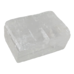 Translucent rectangular selenite crystal on white background