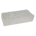 Translucent white rectangular stone block on white background