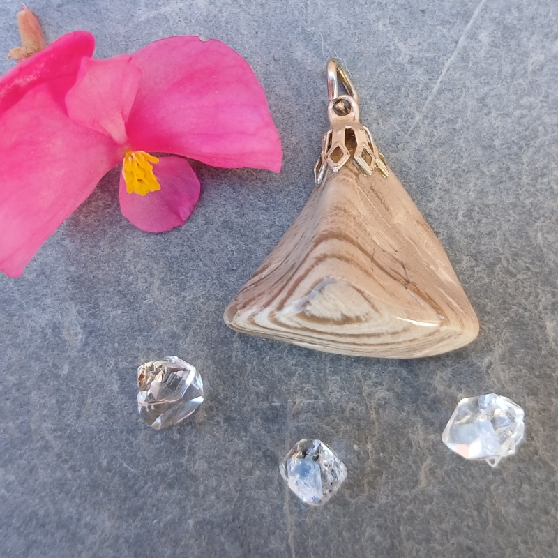 Triangular striped stone pendant with pink flower and crystals