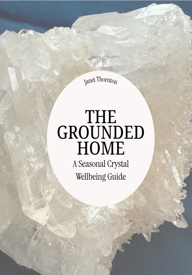 Book cover over clear quartz crystal cluster